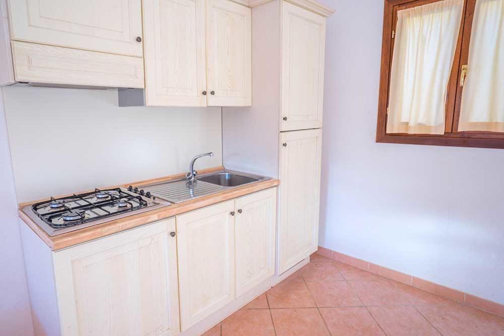 Residence Baia Sant Anna Con Piscina تانايونيلا المظهر الخارجي الصورة