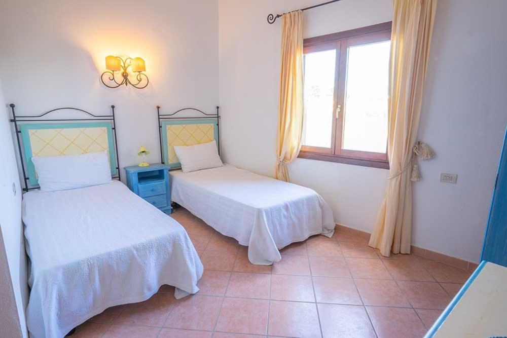 Residence Baia Sant Anna Con Piscina تانايونيلا المظهر الخارجي الصورة