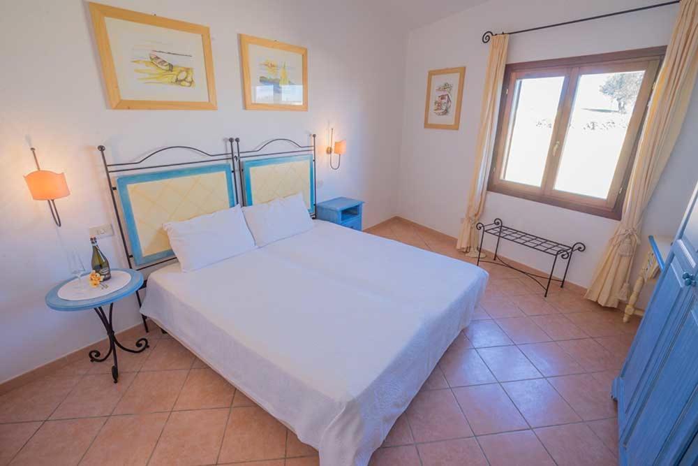 Residence Baia Sant Anna Con Piscina تانايونيلا المظهر الخارجي الصورة